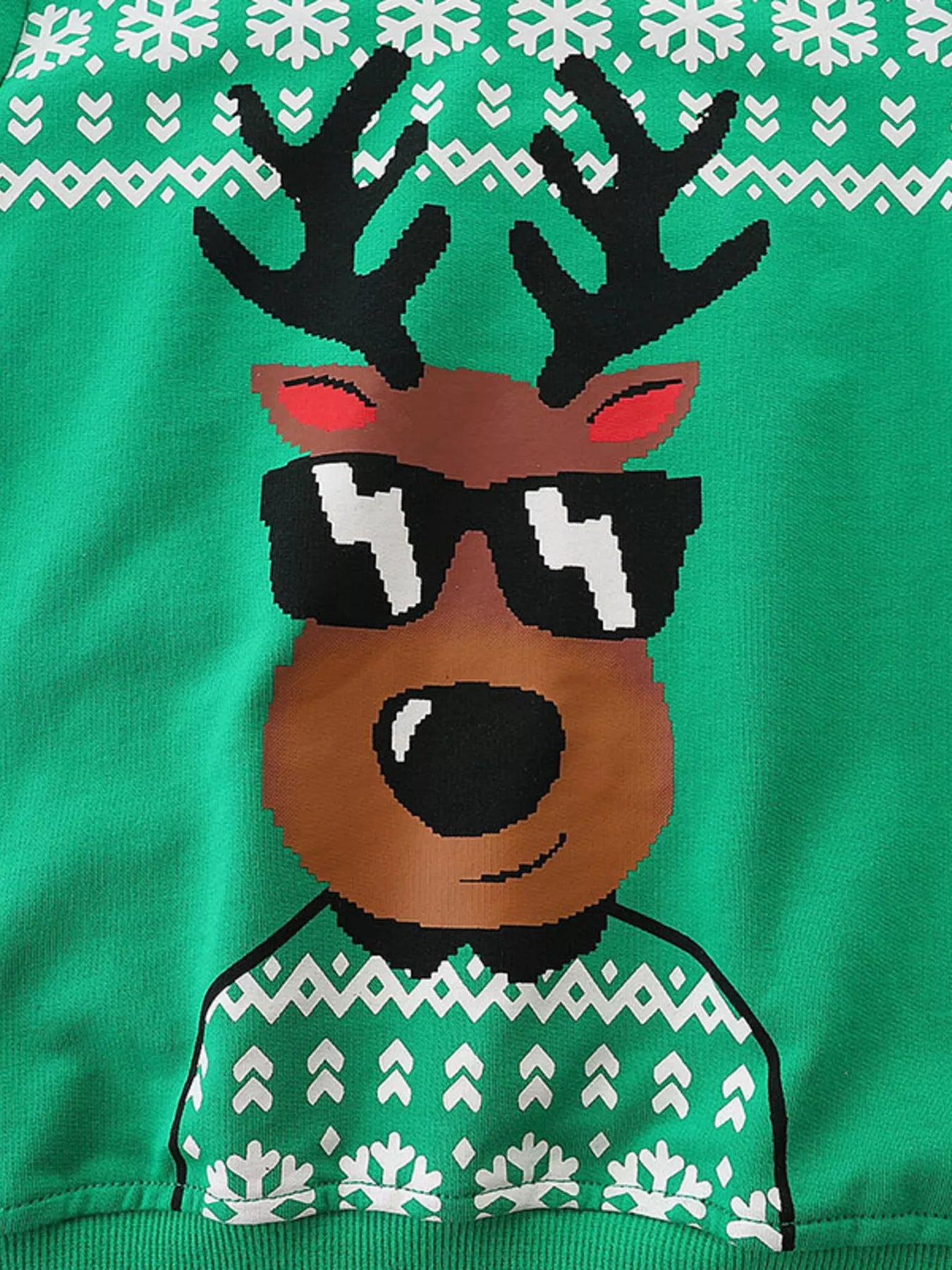 Green kids Christmas sweatshirt with a cool reindeer wearing sunglasses and white snowflake patterns.