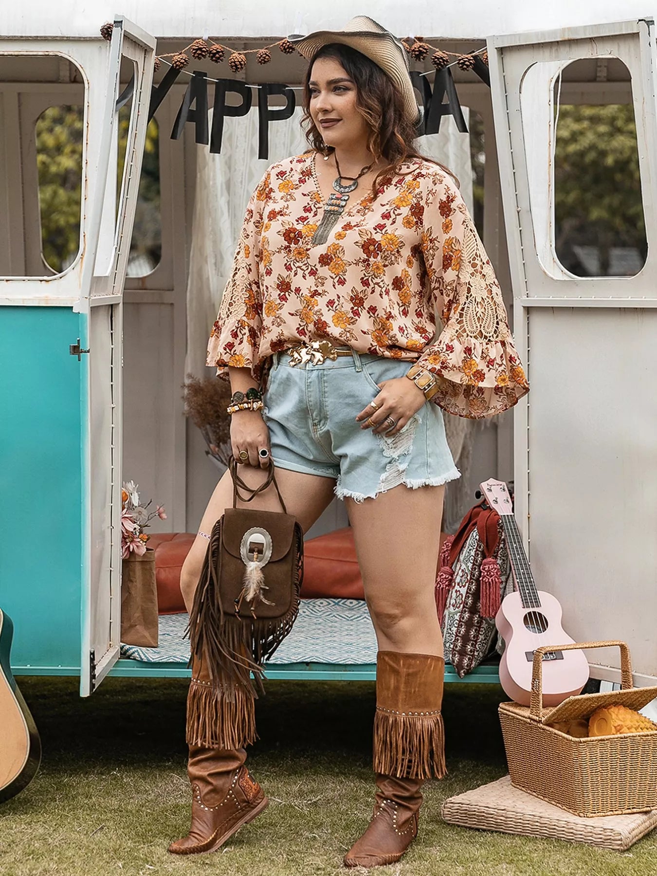 Plus size boho floral blouse with lace bell sleeves in peach, styled with denim shorts and cowgirl hat – Autumn Bloom Lace Top for women.