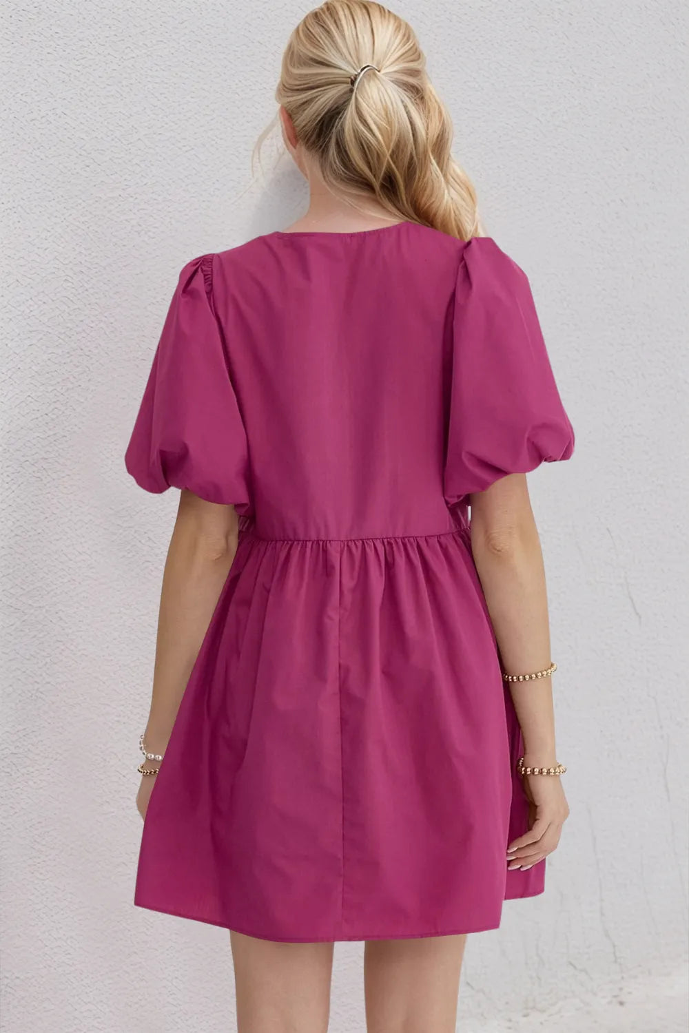 Berry pink mini dress with bow front detail and puff sleeves