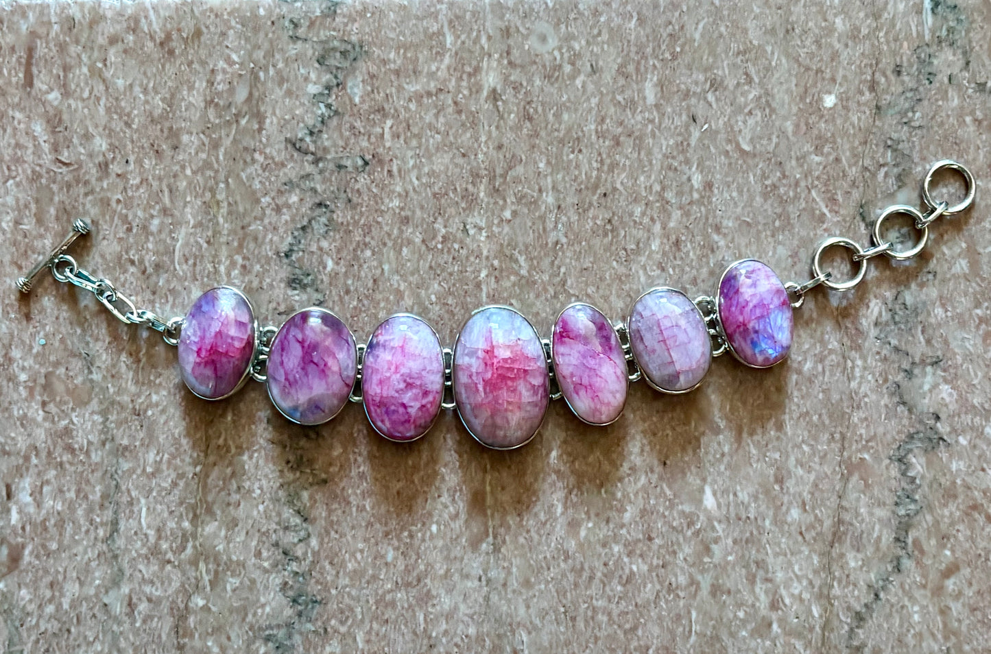 Pink moonstone bracelet with oval stones set in sterling silver