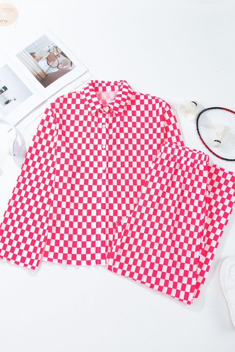Pink and white checkered two piece lounge set with button down top and wide leg pants