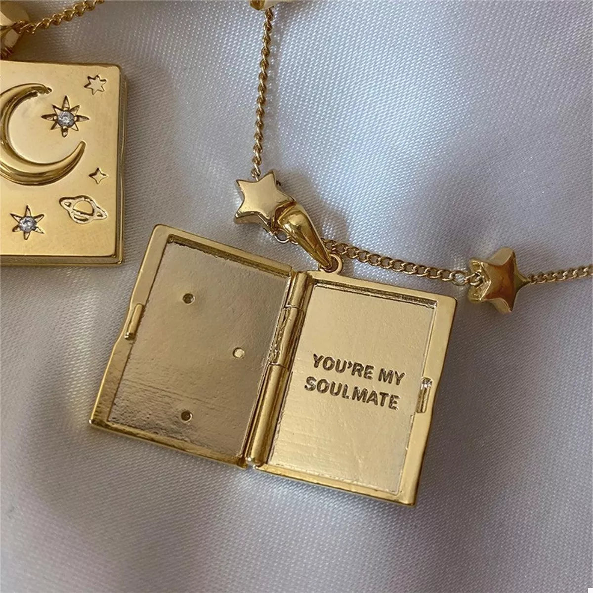 18K gold-plated star and moon locket necklace with zircon details and “You’re My Soulmate” engraving inside.