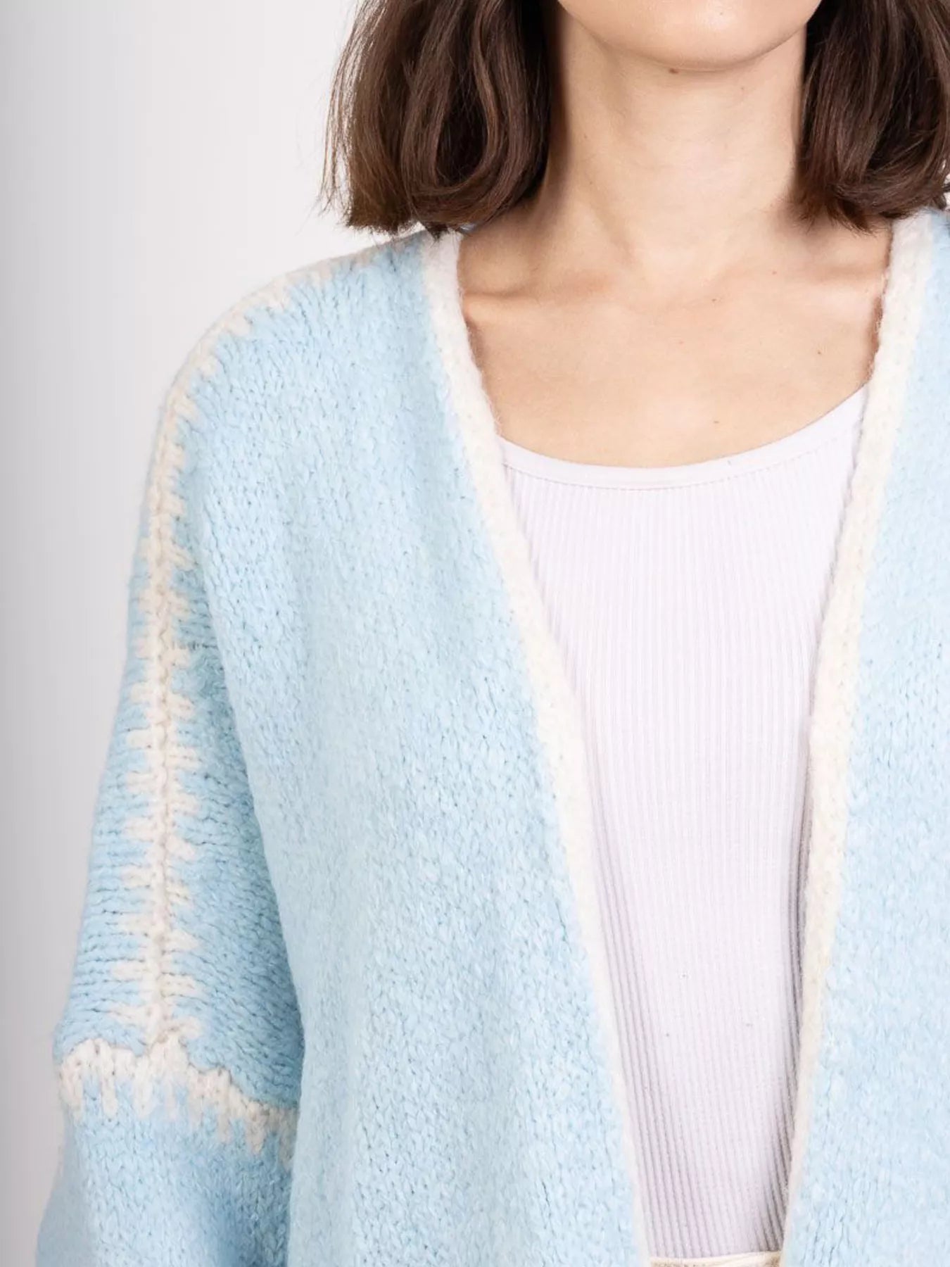 Open-front knit cardigan with contrast trim detail