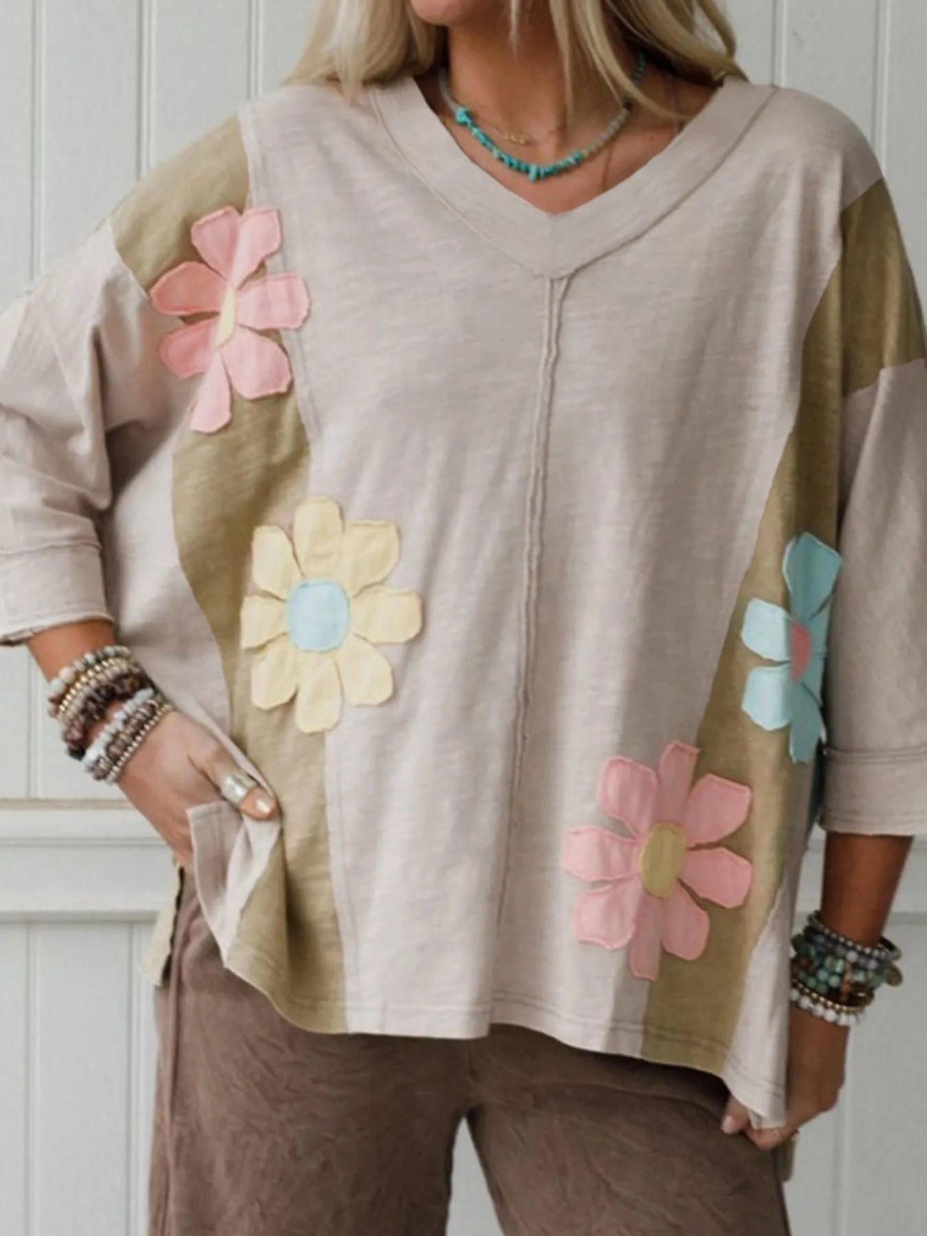 Beige and olive color block V-neck tee with pastel daisy floral patches – Daisy Patch Vibe style from A Whimsical Affair.