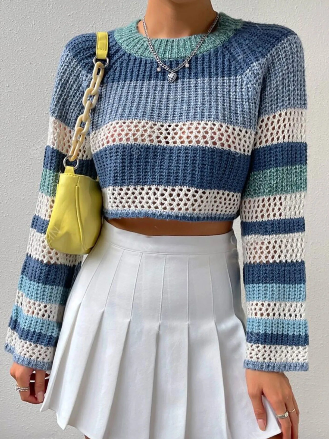 Dusty Horizon Crop Sweater – openwork striped color block knit in dusty blue with flared sleeves.