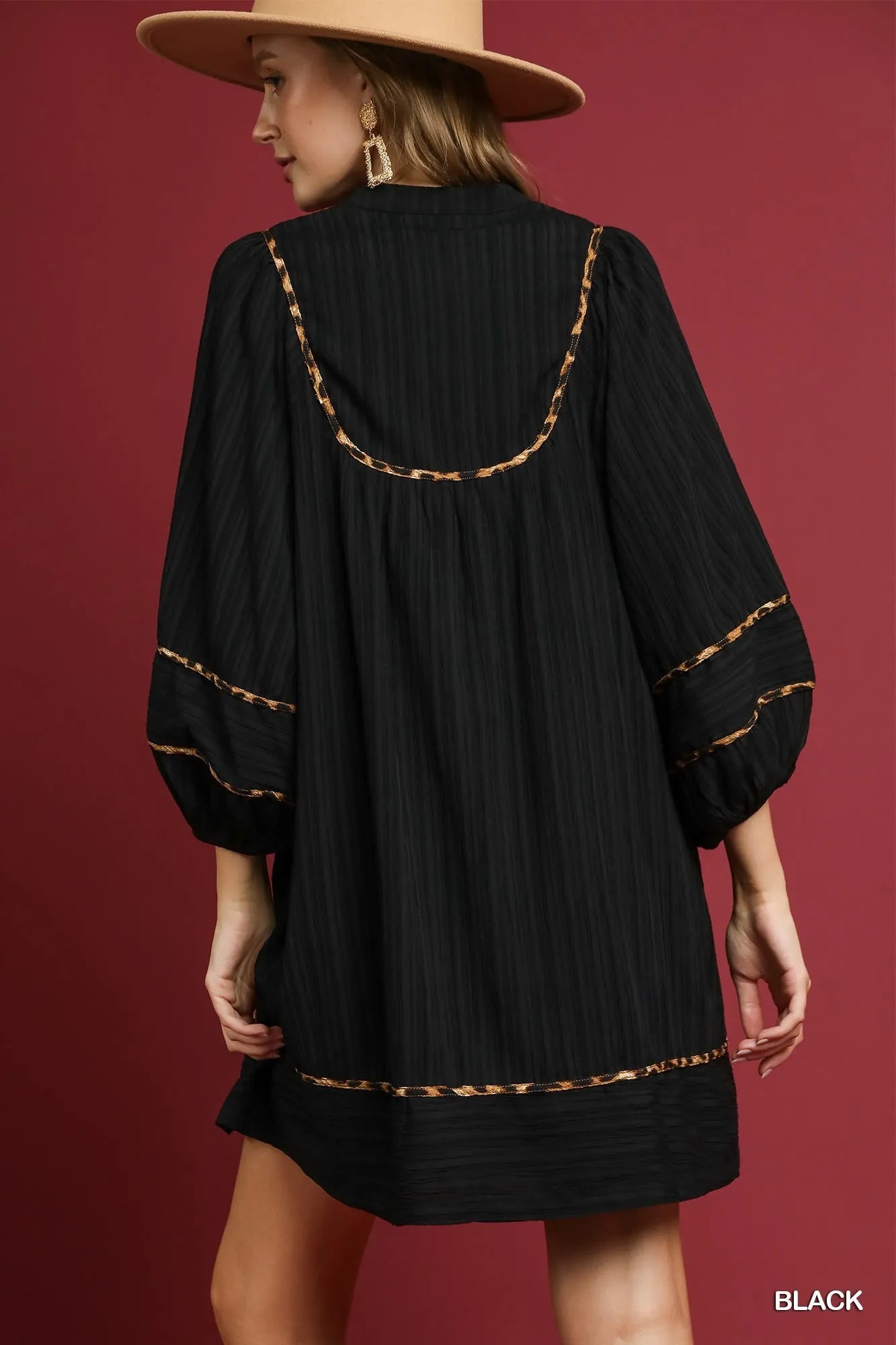 Black textured babydoll dress with leopard print trim – Eclipse style from A Whimsical Affair.