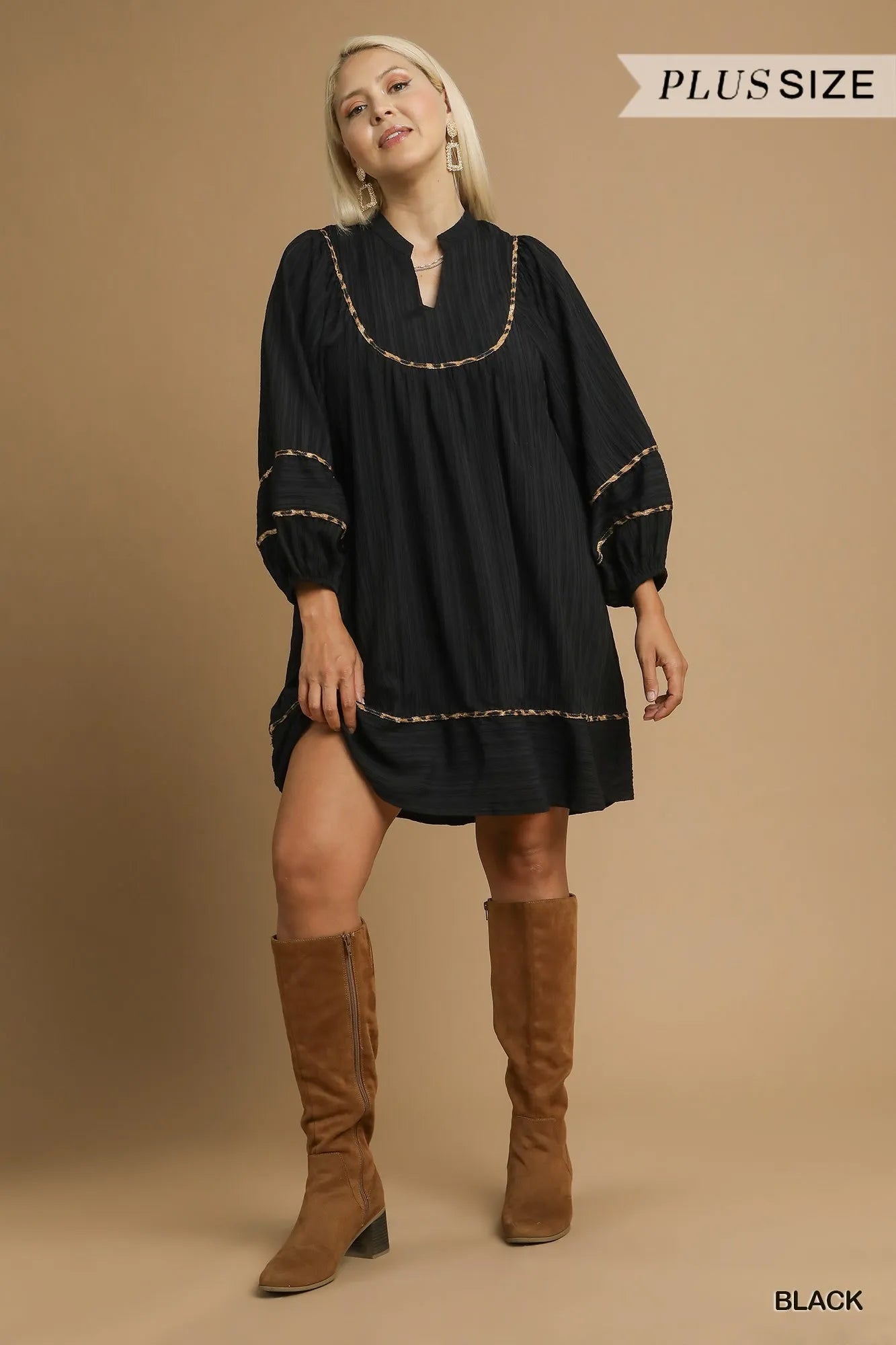 Plus size black textured babydoll dress with leopard print trim – Eclipse style from A Whimsical Affair.