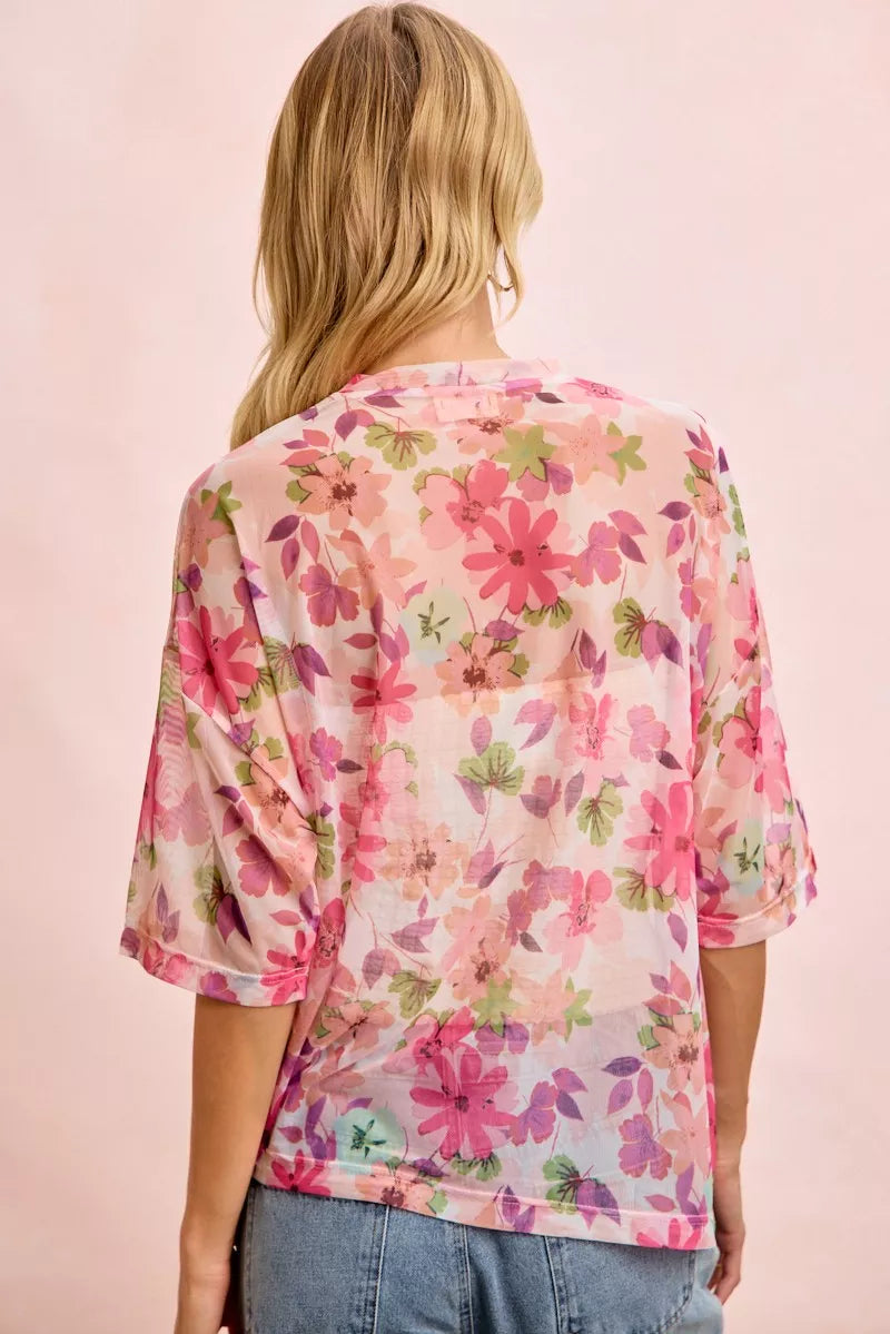 Pink floral sheer mesh short sleeve boxy top styled with light denim