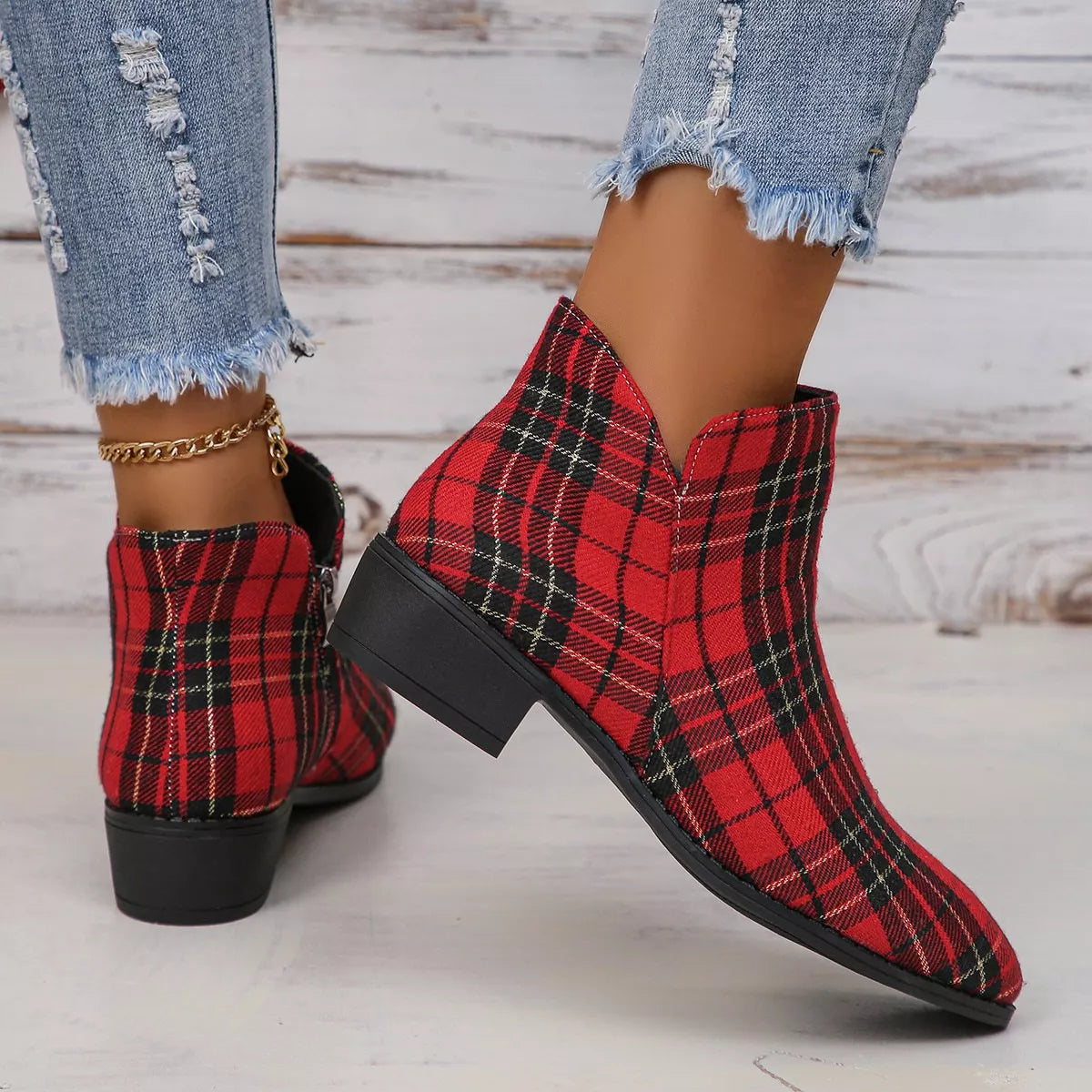 Vintage-inspired plaid ankle boots with a low heel styled with cropped denim