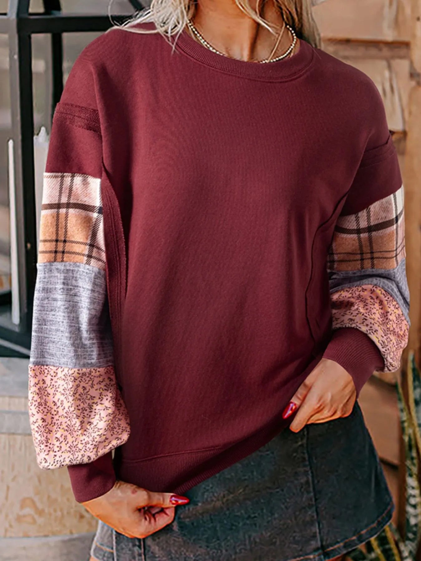 Wine-colored oversized sweatshirt with mixed patchwork plaid and textured sleeves – Patchwork Charm style from A Whimsical Affair.