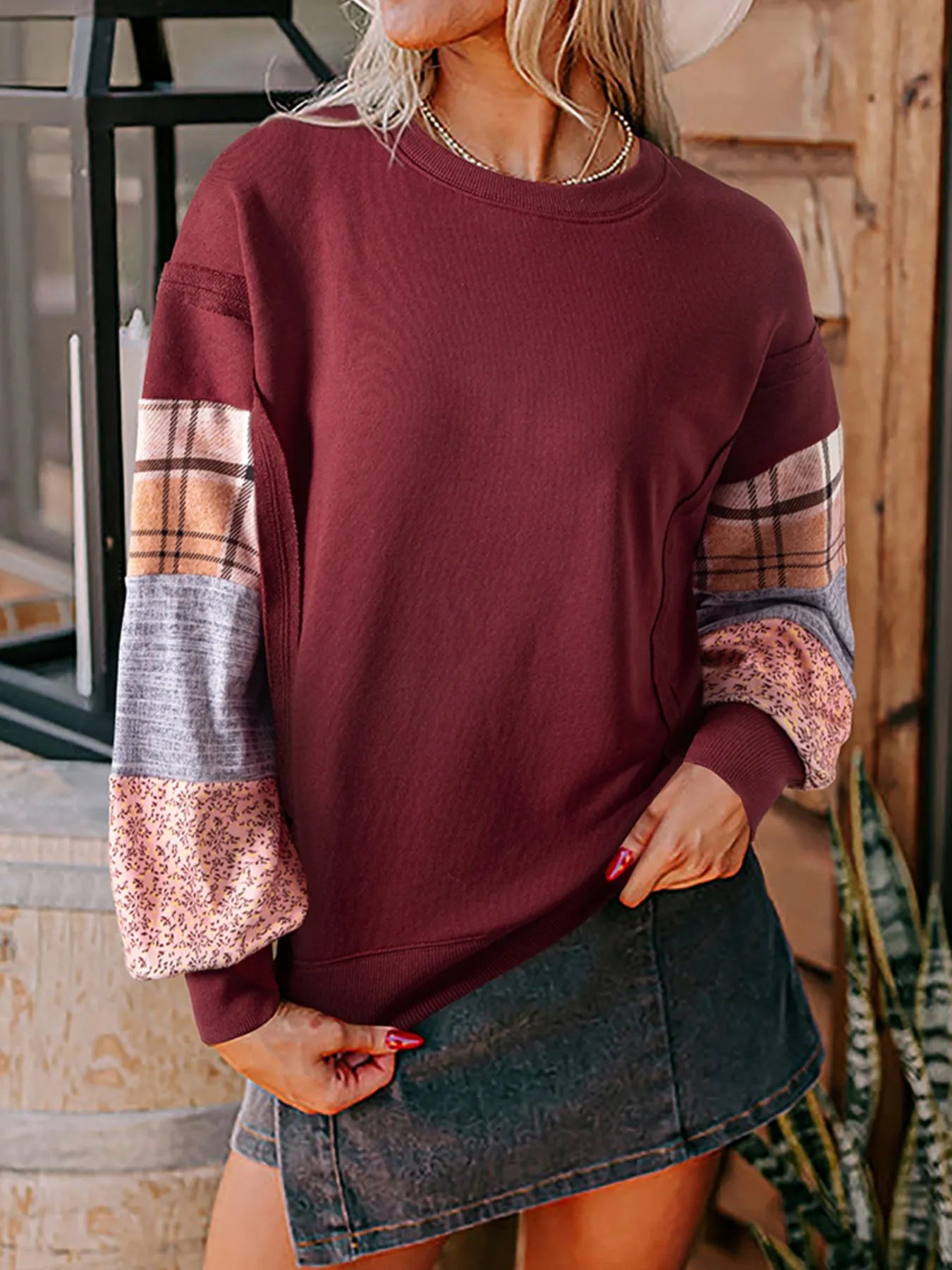 Wine-colored oversized sweatshirt with mixed patchwork plaid and textured sleeves – Patchwork Charm style from A Whimsical Affair.