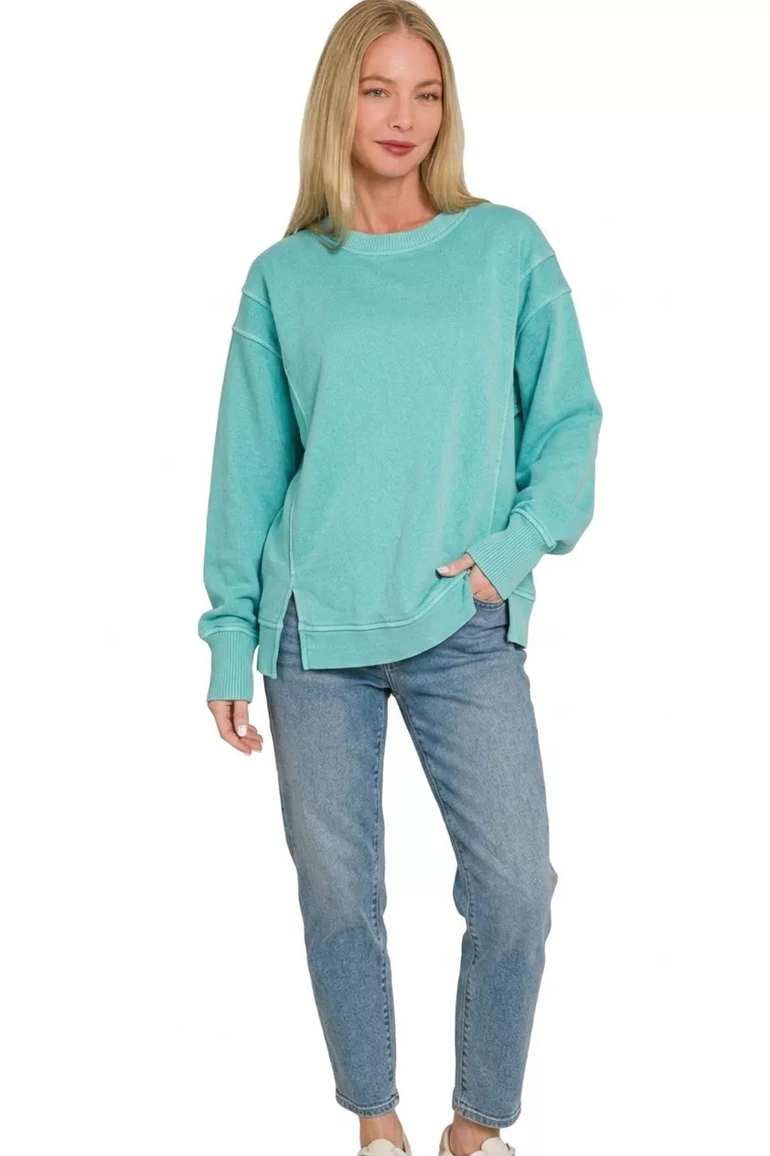 Turquoise relaxed-fit sweatshirt with seam detailing and ribbed cuffs