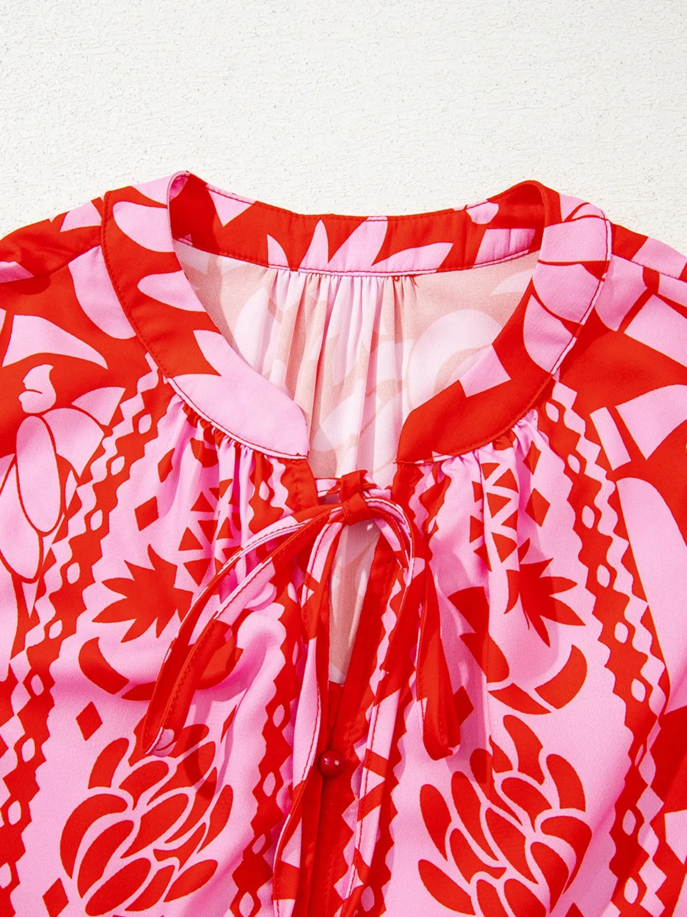 Strawberry-red floral tie-neck button-down blouse with long sleeves – Strawberry Bloom style from A Whimsical Affair.