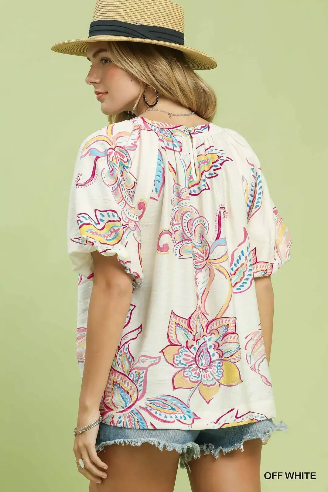 oversized boho paisley tunic top with pastel floral print and relaxed flowy silhouette