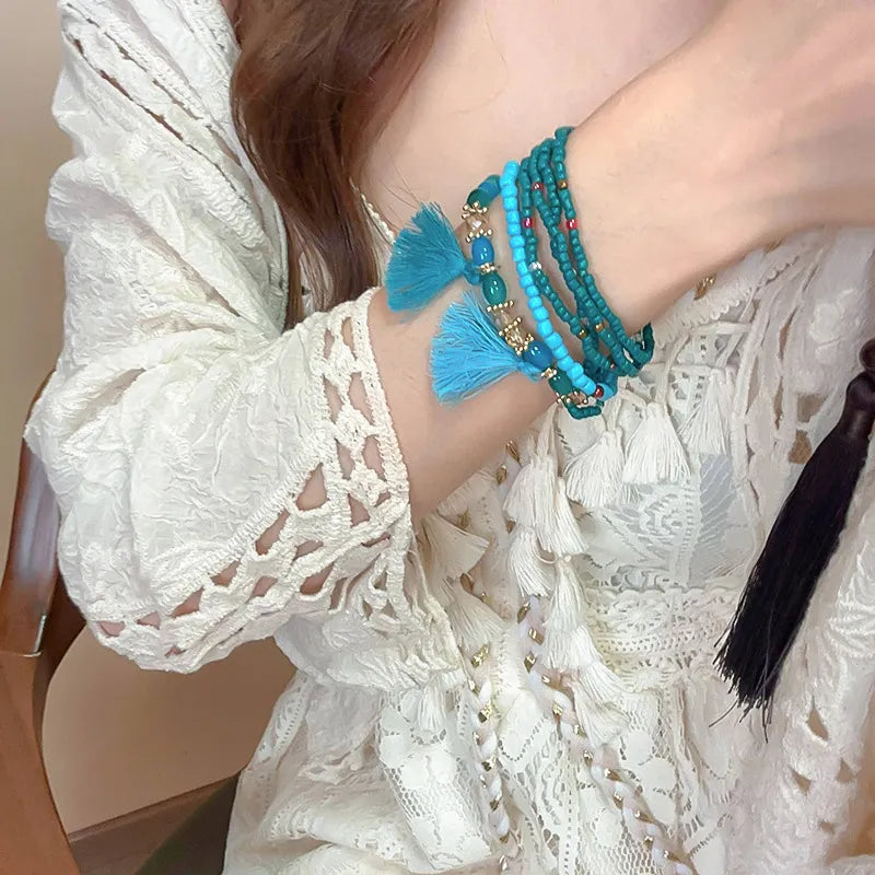 Royal blue rice bead bracelet with tassel accent – Whisper style from A Whimsical Affair.