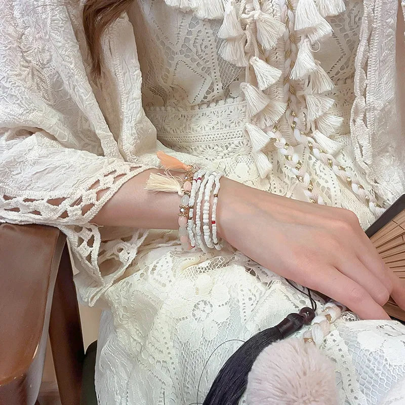 White rice bead bracelet with tassel accent – Whisper style from A Whimsical Affair.