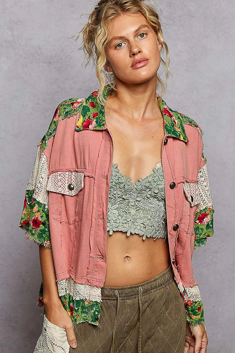 Oversized patchwork shacket with denim, floral print, and crochet lace sleeves – Wildflower Patchwork style from A Whimsical Affair.