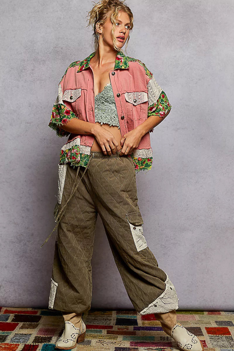 Oversized patchwork shacket with denim, floral print, and crochet lace sleeves – Wildflower Patchwork style from A Whimsical Affair.