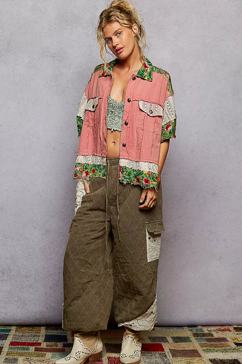 Oversized patchwork shacket with denim, floral print, and crochet lace sleeves – Wildflower Patchwork style from A Whimsical Affair.