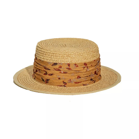 Structured straw hat with floral fabric band and flat brim