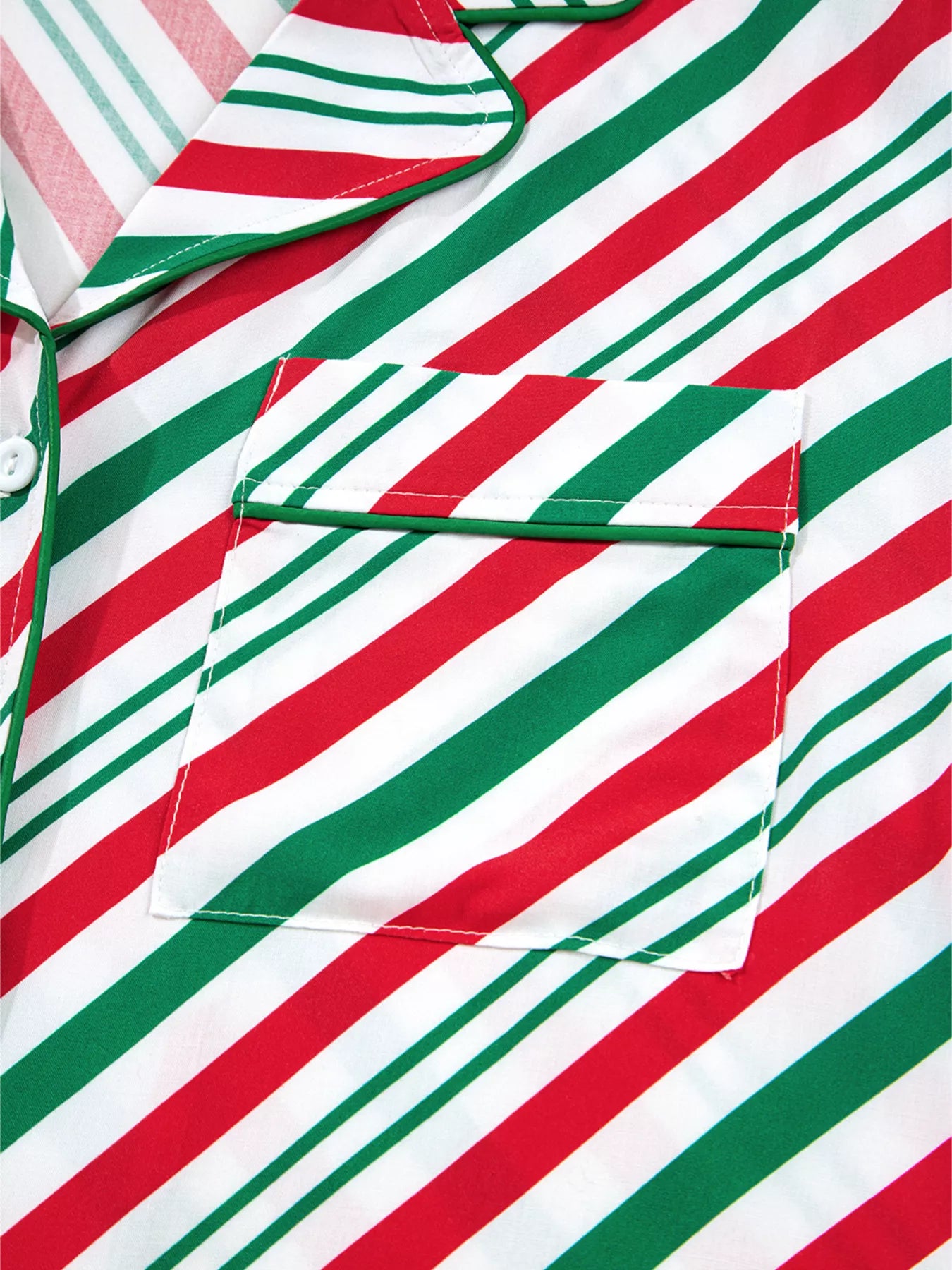 Festive striped two-piece pajama set with velvet waist tie and long sleeves.