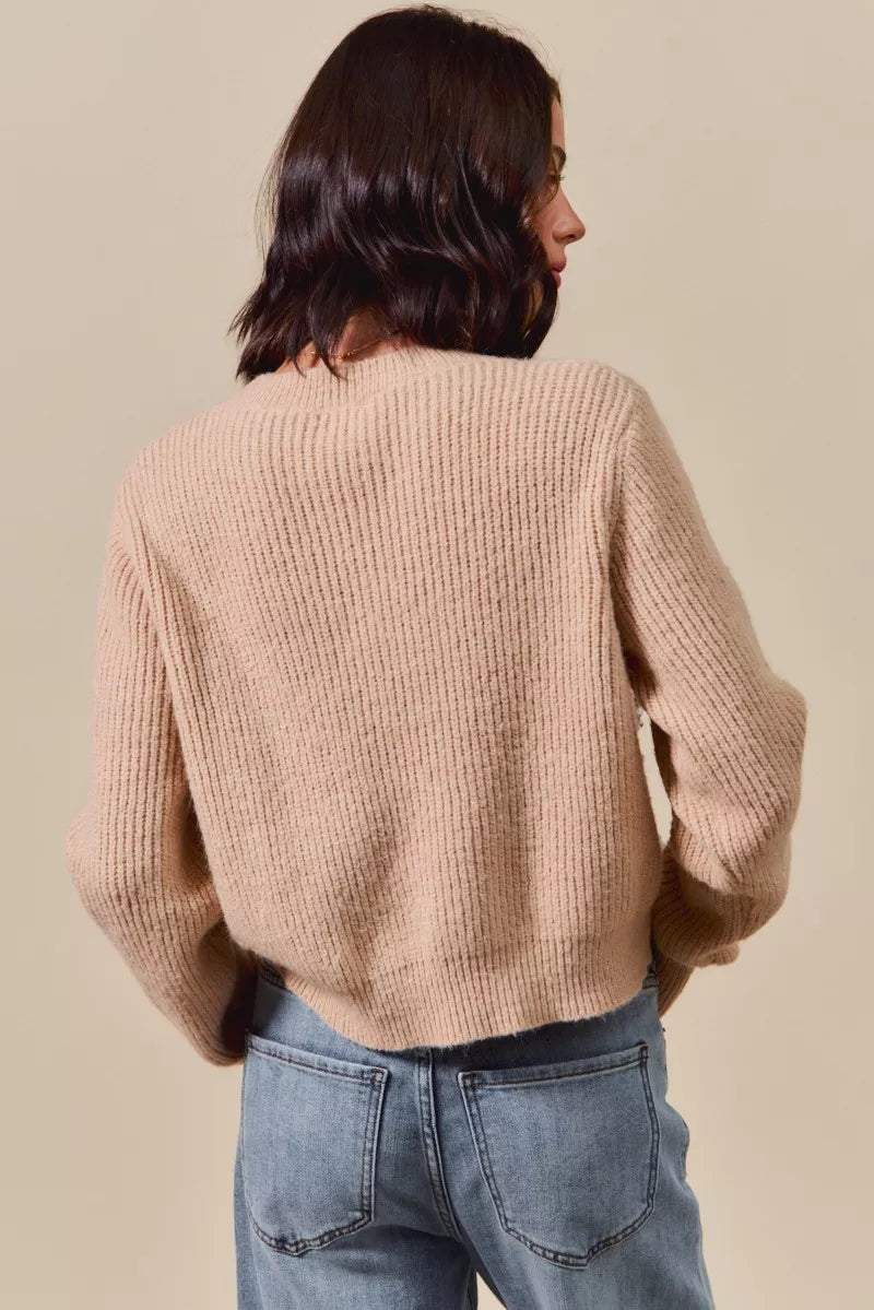 Close-up of taupe ribbed knit sweater with plaid bow accents – feminine countryside winter fashion from A Whimsical Affair.