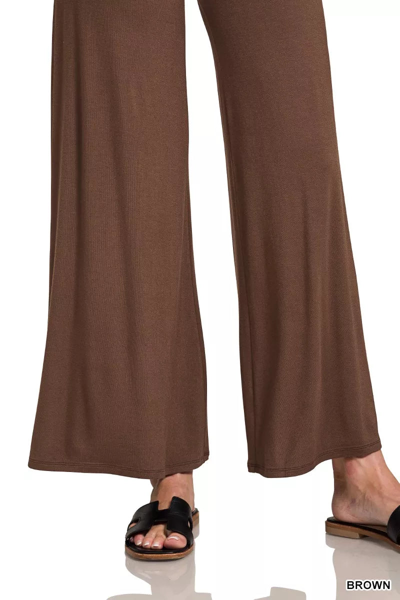 Woman wearing brown fold-over waist wide-leg lounge pants — cozy relaxed fit bottoms from A Whimsical Affair.