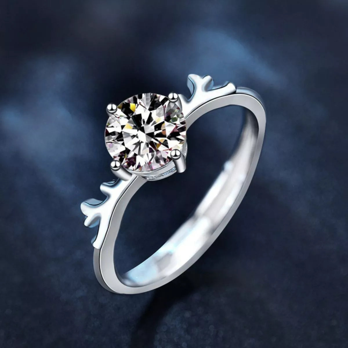 Close-up of antler design moissanite solitaire ring