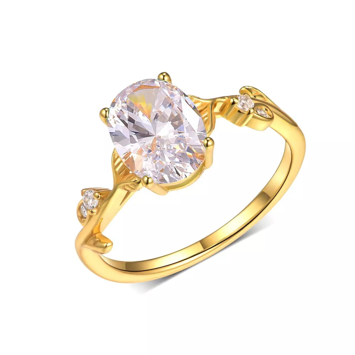 Gold oval moissanite ring with vine-like band and small zircon accents displayed in a blush jewelry box.