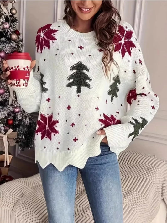 Festive knit sweater with Christmas trees and poinsettia design styled with jeans for winter outfit.
