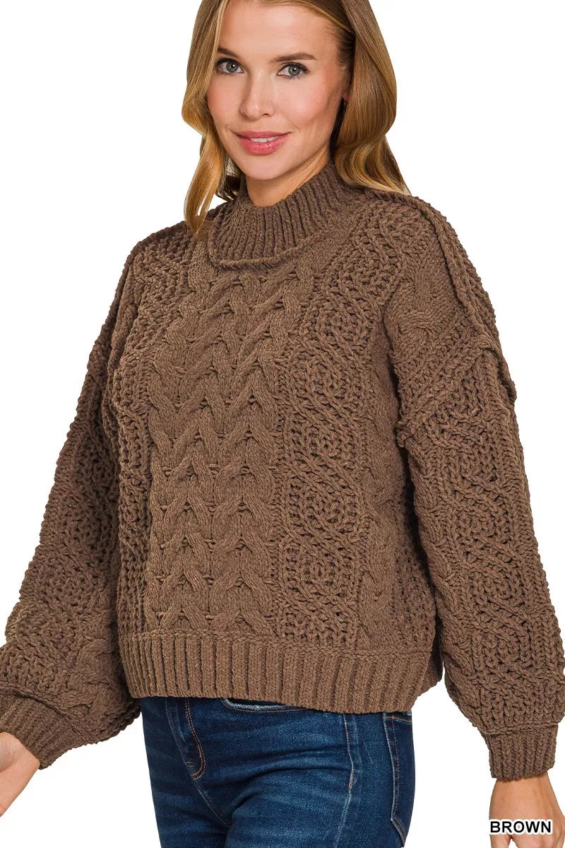 Women’s cozy brown cable-knit sweater with ribbed mock neck and relaxed fit, perfect for winter layering and casual outfits.