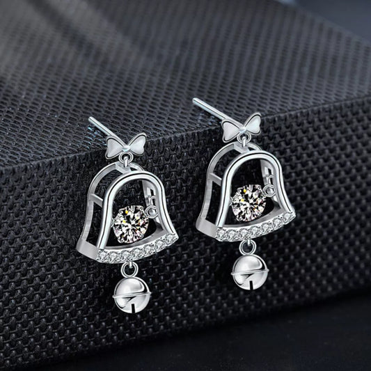 Pair of platinum-plated sterling silver bell earrings with 0.5ct moissanite center stones and dangling jingle bells.