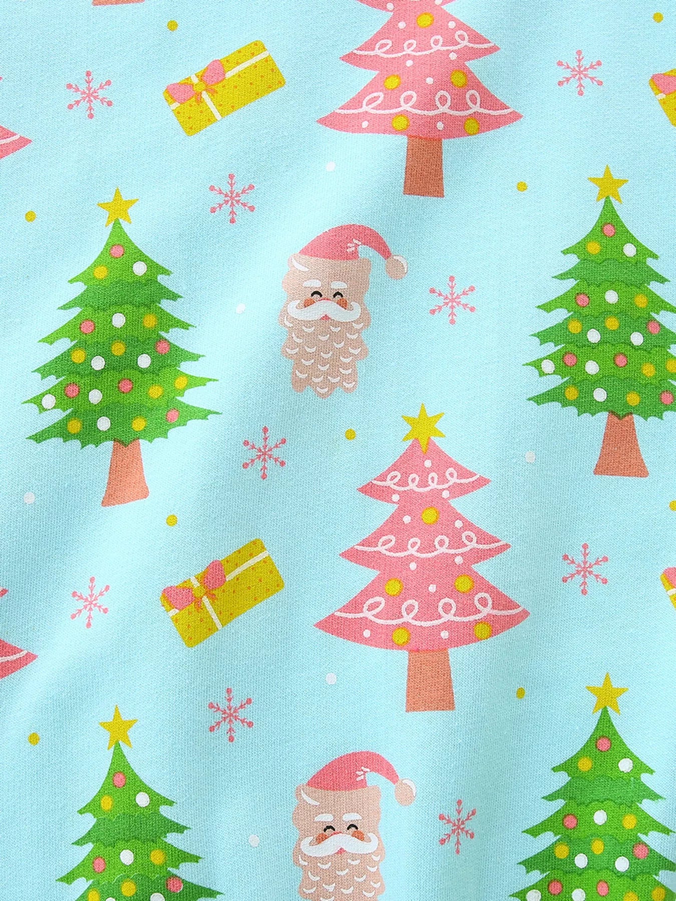 A light blue kids sweatshirt decorated with Santa faces, Christmas trees, and gift illustrations for a festive holiday look.
