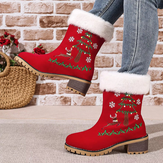 Red suede Christmas boots with faux-fur cuffs, embroidered reindeer, Christmas trees, holly, and snowflakes.