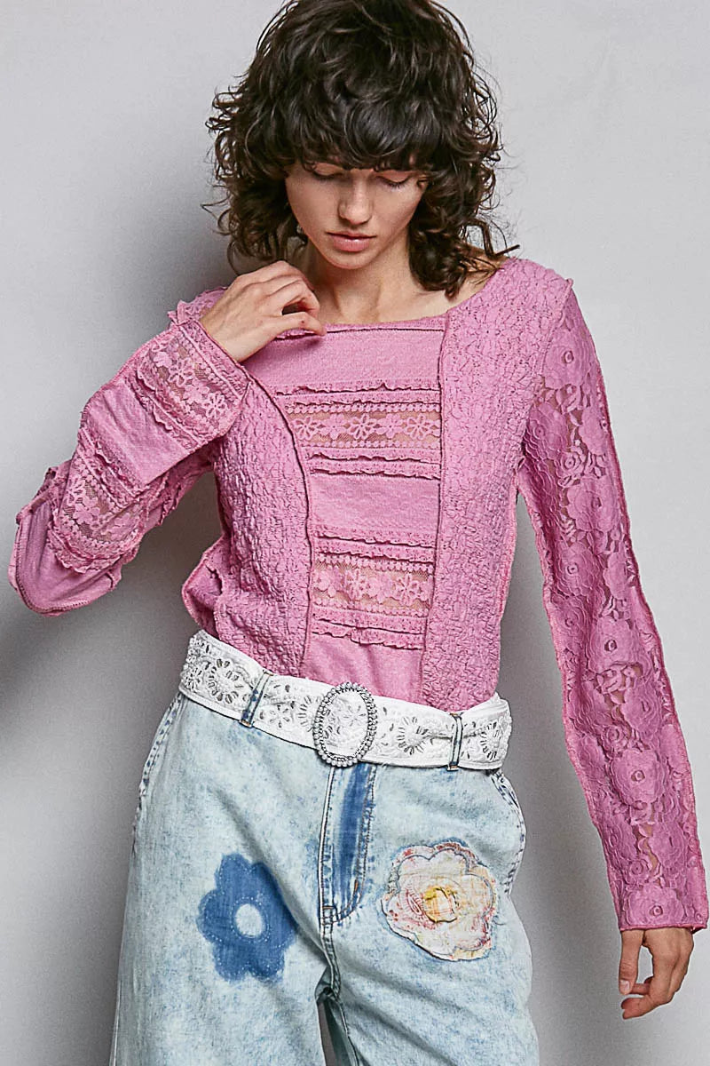 Pink lace long sleeve slim-fit top with patch detailing and high-low hem styled with light wash denim