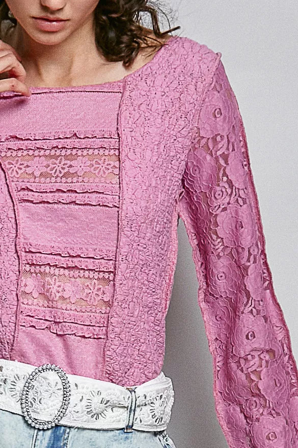 Pink lace long sleeve slim-fit top with patch detailing and high-low hem styled with light wash denim