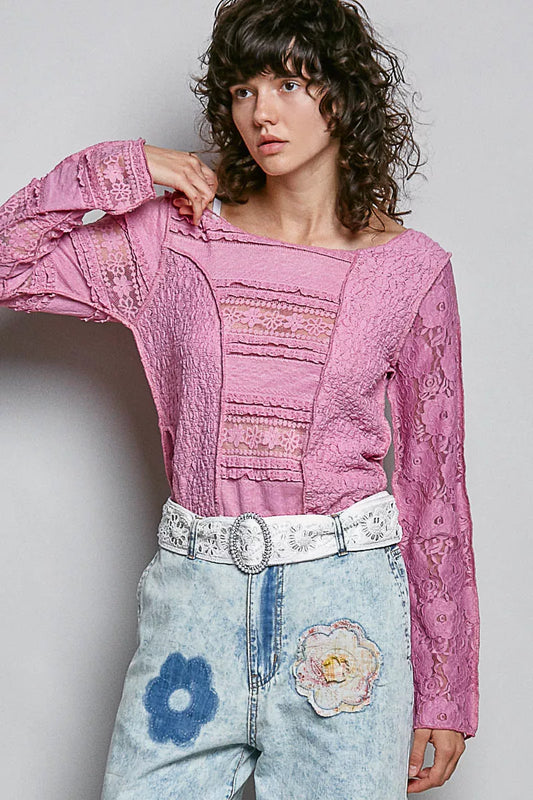 Pink lace long sleeve slim-fit top with patch detailing and high-low hem styled with light wash denim