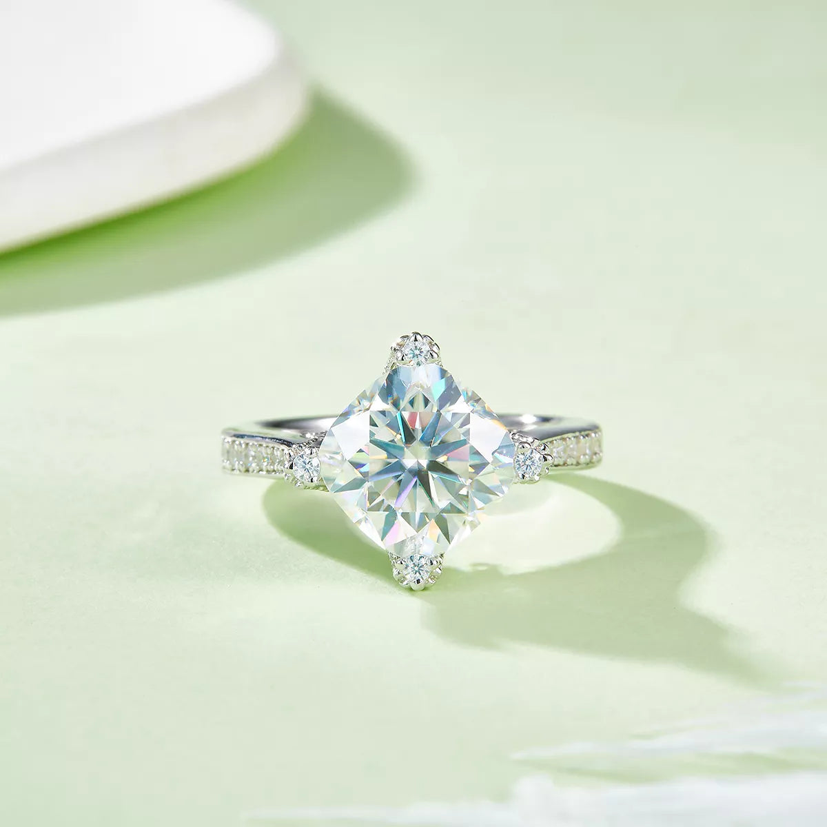 Diagonal cushion moissanite engagement ring with pavé band and gift-ready shine