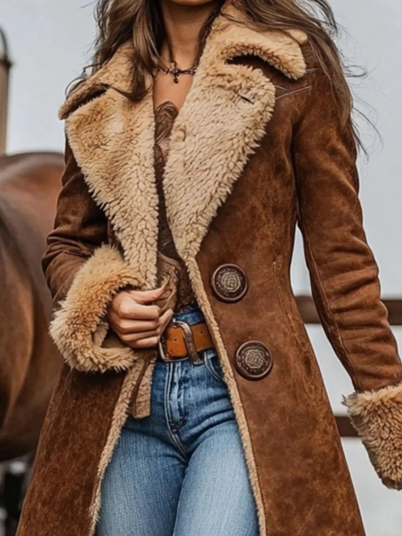 Long brown faux suede sherpa duster coat styled with jeans and boots