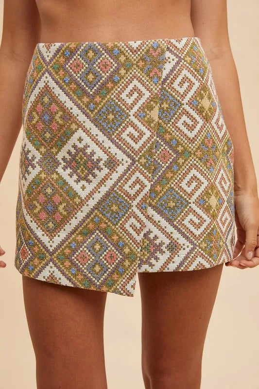 Annie Wear jacquard wrap mini skirt with ethnic-inspired woven jacquard and split detail – Wanderlust style from A Whimsical Affair.