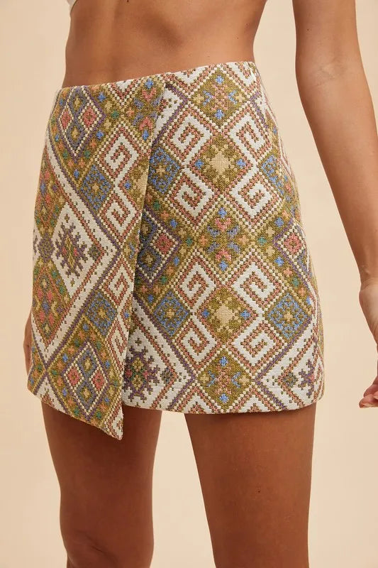 Annie Wear jacquard wrap mini skirt with ethnic-inspired woven jacquard and split detail – Wanderlust style from A Whimsical Affair.