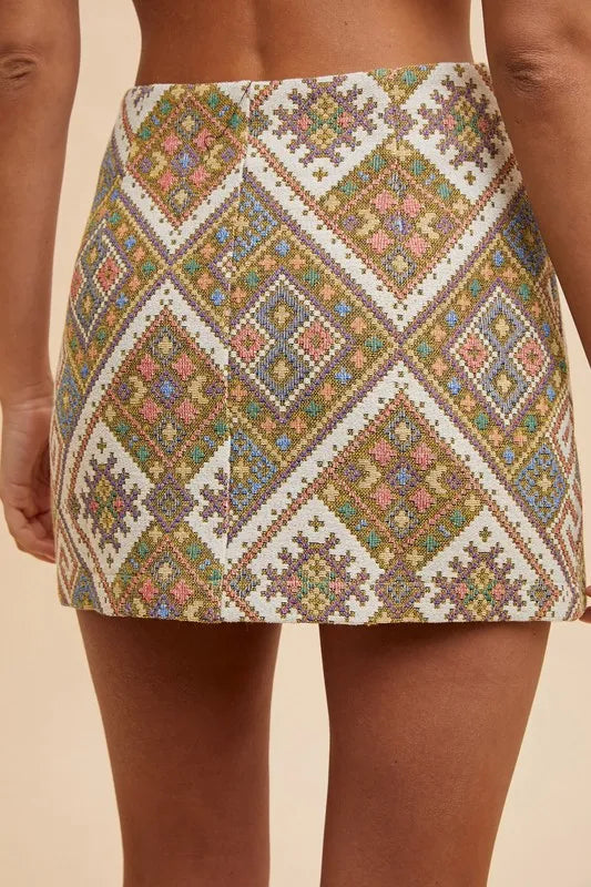 Annie Wear jacquard wrap mini skirt with ethnic-inspired woven jacquard and split detail – Wanderlust style from A Whimsical Affair.