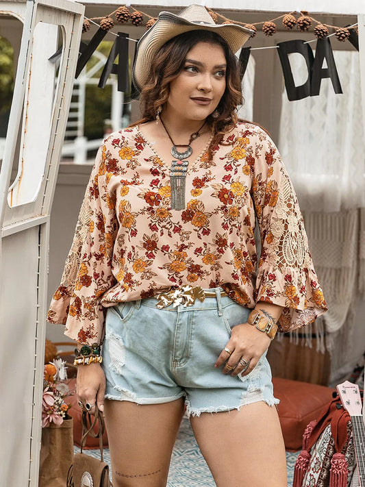 Plus size boho floral blouse with lace bell sleeves in peach, styled with denim shorts and cowgirl hat – Autumn Bloom Lace Top for women.