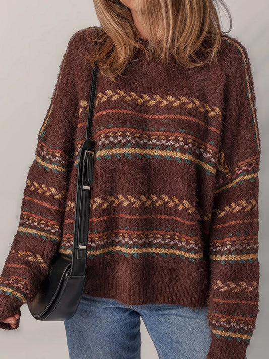 Brown oversized fuzzy sweater with fair isle-style stripes in warm earthy tones.