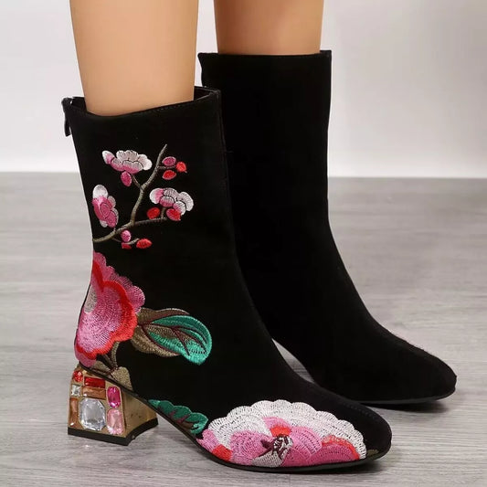 Black suede embroidered ankle boots with floral detailing and rhinestone mid heel