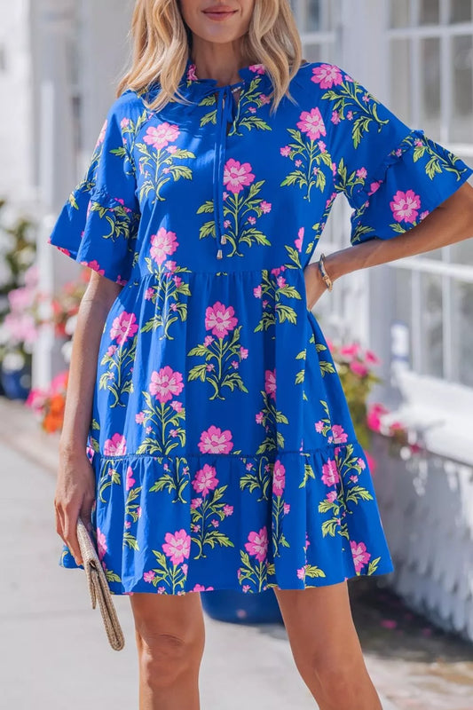 Floral tiered dress with flutter sleeves and tie neckline