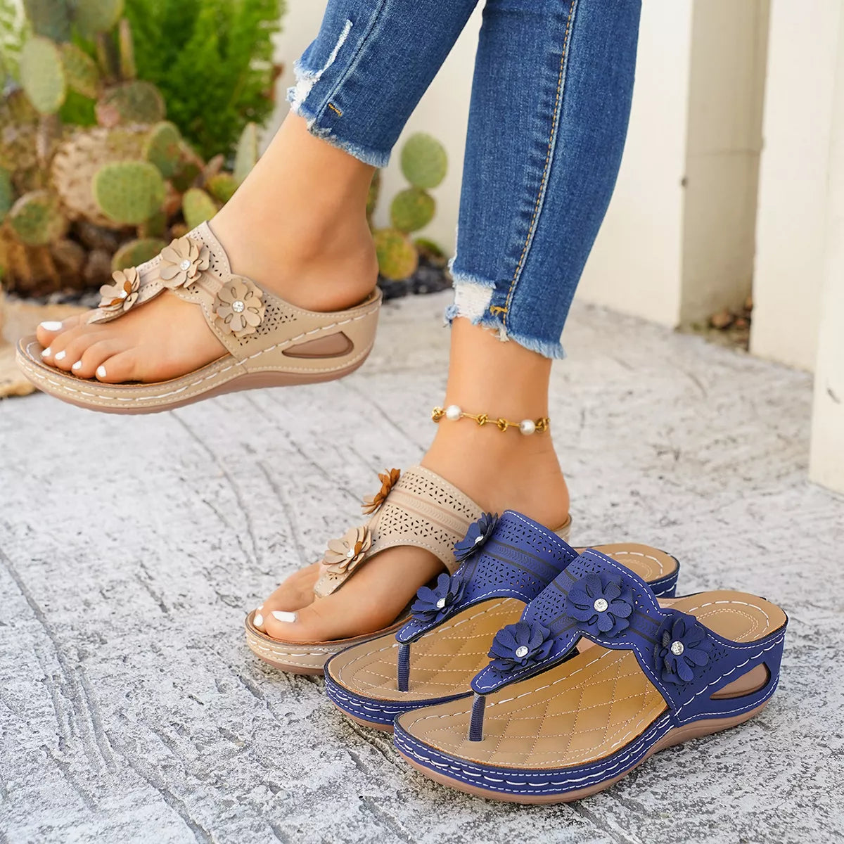 Low heel slip-on thong sandals with floral appliqué details, cutout accents, PU leather material, and rubber sole shown in multiple colors.