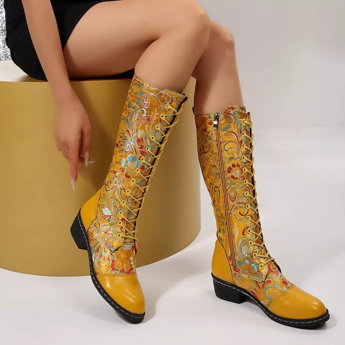 Yellow lace-up block heel boots with floral accents – Bloomstep style from A Whimsical Affair.