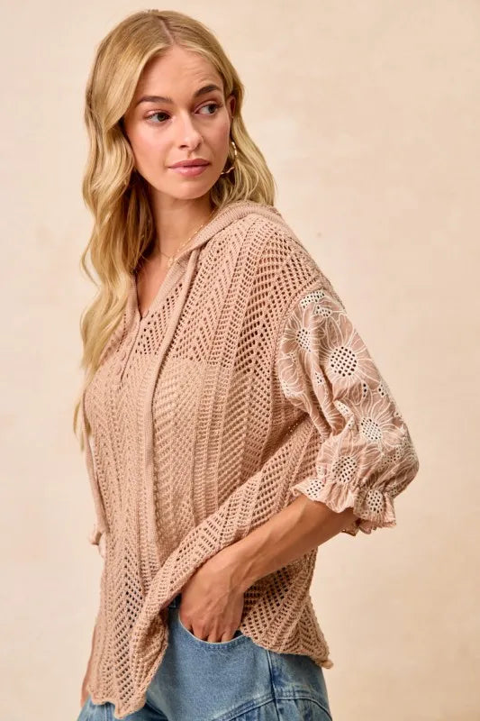 Taupe hooded knit top with jacquard floral pattern, lace accents, and puff sleeves – Blossom Haven style from A Whimsical Affair.