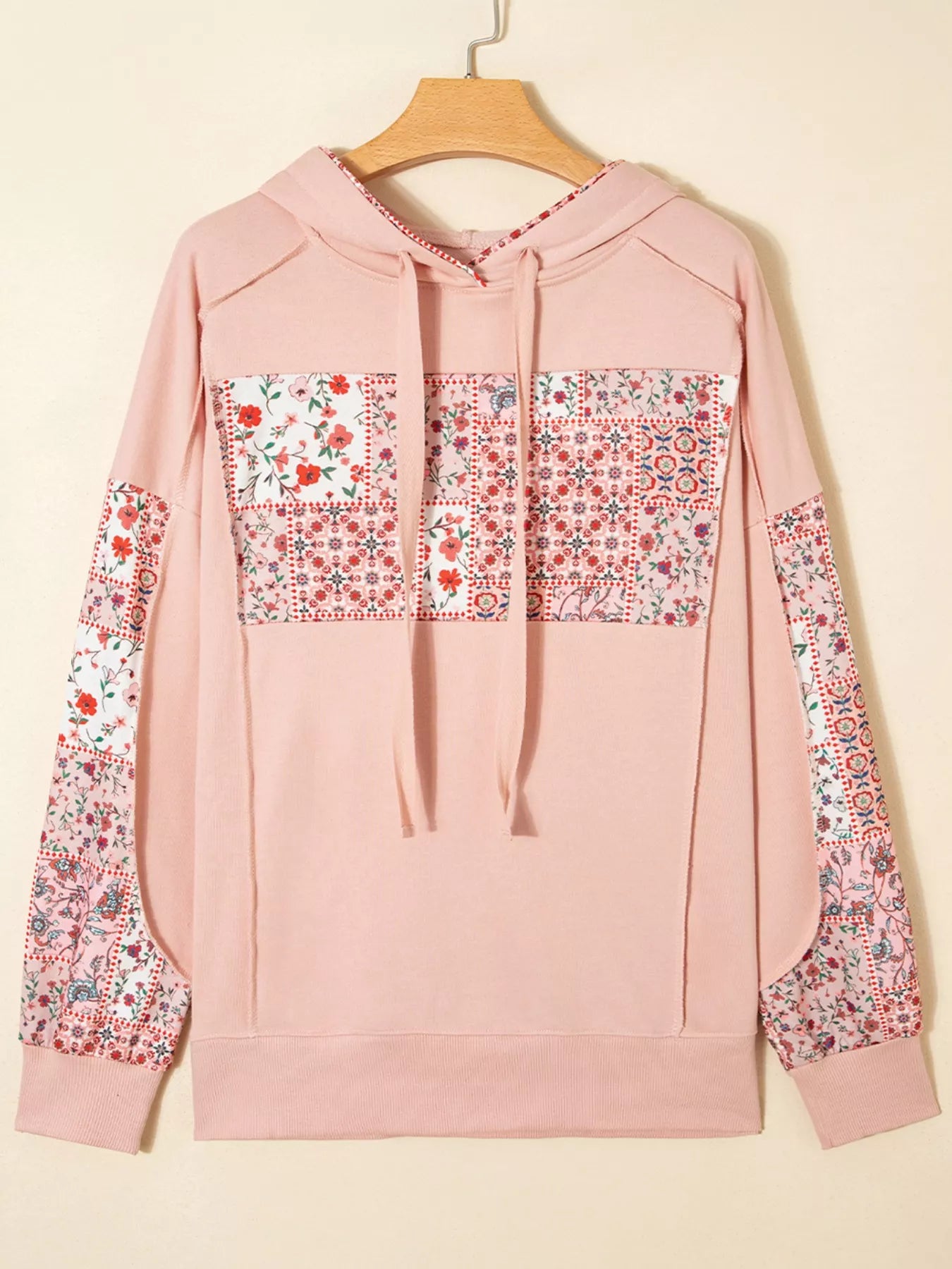 Blossom Path Hoodie in dusty pink with floral patchwork details and drawstring hood